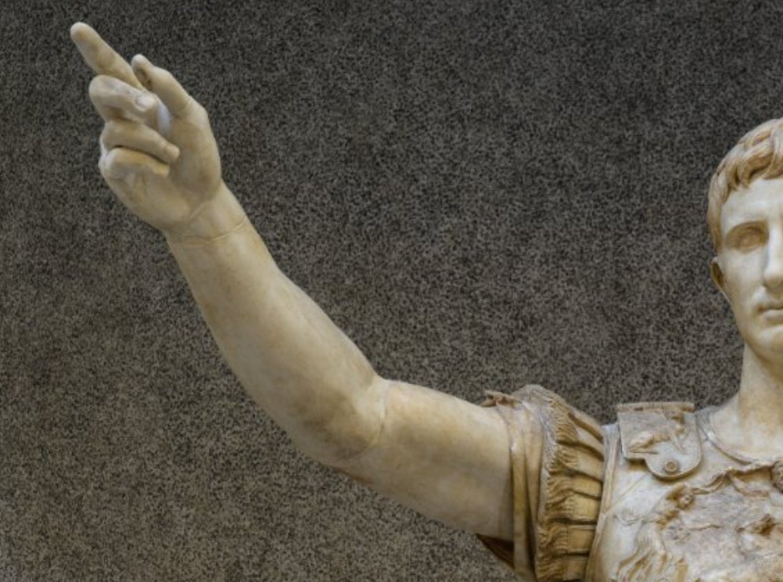 Augustus's raised arm and head